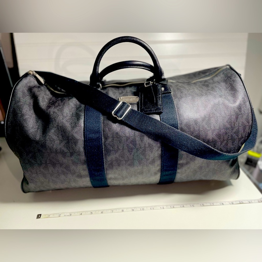 Black Michael Kors overnight travel bag